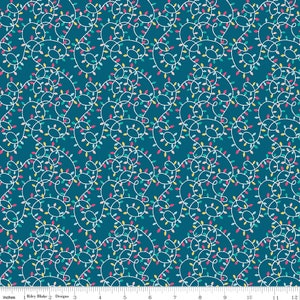 May include: Teal fabric with a white, pink, yellow, and blue string of lights pattern. The lights are in a repeating pattern.