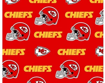 May include: Red background with a repeating pattern of red football helmets, white arrowheads, and the word "CHIEFS" in yellow. The helmet has a white logo on the side.