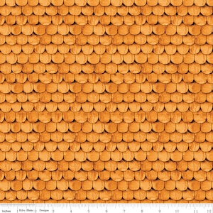 May include: A repeating pattern of overlapping, semi-circular shapes in shades of orange and brown, resembling a roof or scale design. The pattern is evenly spaced and covers the entire surface. The image includes a ruler with inch measurements.