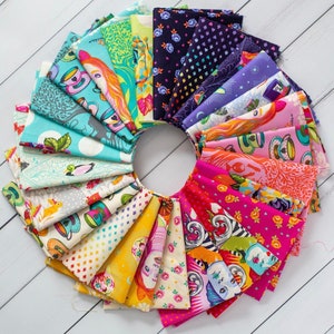May include: A collection of colorful fabric squares with various patterns, including teacups, flowers, and geometric designs. The fabric squares are arranged in a circle, creating a vibrant and whimsical display.