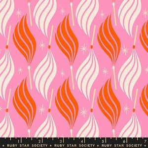 May include: Pink fabric with a repeating pattern of stylized matches with orange and white flames. The matches have tan sticks and red heads. Small white star shapes are scattered throughout the design. The text "RUBY STAR SOCIETY" is at the bottom.