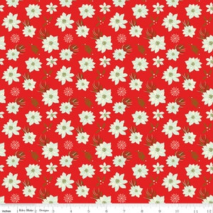 May include: Red fabric with a white floral pattern. The flowers have a green center and are surrounded by small green leaves. There are also small white snowflakes scattered throughout the fabric.