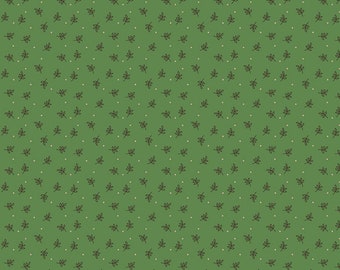 May include: A green fabric with a repeating pattern of small black leaves and white dots. The fabric is 12 inches wide.