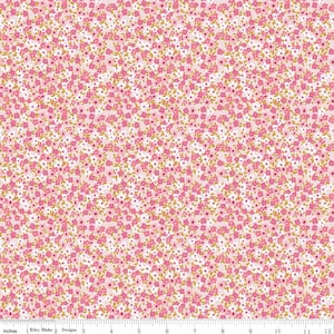 May include: Pink fabric with a repeating pattern of small white and pink flowers with gold accents.