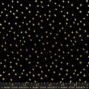 May include: Black fabric with a repeating pattern of gold stars. The fabric has a subtle texture and the stars are slightly raised. The fabric is marked with a ruler in inches and the text "RUBY STAR SOCIETY".