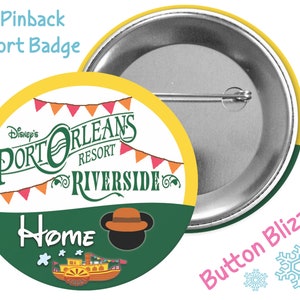 May include: A 3-inch pinback button featuring a yellow, green, and red design with the text "Disney's Port Orleans Resort Riverside" and the word "Home". The button has a white background and a silver pinback.