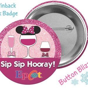 May include: A 3-inch pink glitter pinback button with a pink and white Minnie Mouse head, two wine glasses, and the text "Sip Sip Hooray! Epcot" in pink and white. The back of the button is silver.