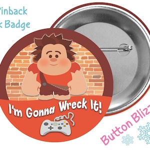 May include: A 3-inch pinback button featuring Wreck-It Ralph from the Disney movie Wreck-It Ralph. The button is red and features a brick wall background. Ralph is standing in front of the wall with a video game controller in front of him. The text "I'm Gonna Wreck It!" is printed on the button.
