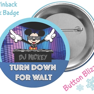 May include: A 3-inch pinback button featuring a cartoon image of Mickey Mouse as a DJ with the text "DJ Mickey" and "Turn Down For Walt". The button has a blue background with a light blue border and a silver back.