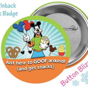 May include: A 3-inch pinback park badge featuring Goofy holding balloons and popcorn, with the text "Just here to GOOF around! (and get snacks)". The badge has a green and orange border with a light blue background.