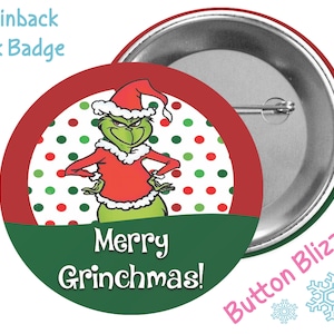 May include: A 3-inch pinback button featuring the Grinch wearing a Santa hat and a red and white suit. The button has a green, red, and white polka dot background and the text "Merry Grinchmas!"