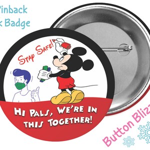 May include: A 3-inch pinback park badge featuring Mickey Mouse in a red and black design. Mickey is holding hand sanitizer and a marker, with the text "Stay Safe!" and "Hi Pals, We're in this Together!" The badge has a silver back.