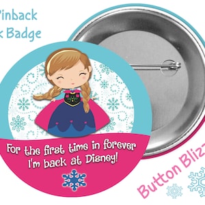 May include: A 3-inch pinback park badge featuring a cartoon image of Anna from Frozen. The badge is pink and blue with a snowflake design and the text "For the first time in forever I'm back at Disney!"  The back of the badge is silver with the text "Button Blizzard".