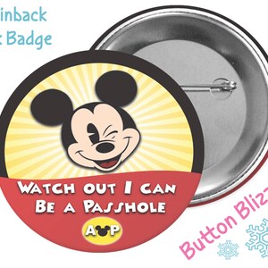 May include: A 3 inch pinback button featuring a cartoon image of Mickey Mouse with the text "Watch out I can be a passhole" and the letters "AOP" in a circle with a Mickey Mouse head.
