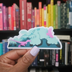 May include: A pink dinosaur sticker with a green and blue jungle background. The dinosaur is running and there is a pink bird flying in the background.