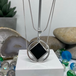 Narcotics Anonymous Black and Silver Pendant (NAP-05) comes with chain