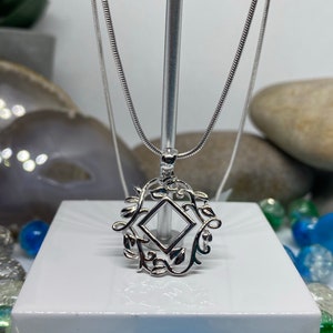 NA Symbol with Vine border comes with chain (NAP-12)