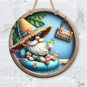 May include: A round wooden sign with a gnome wearing a straw hat, sunglasses, and a tropical shirt. The gnome is sitting in a blue inflatable ring in a pool of water. The sign says "It's Five O'Clock Somewhere".