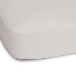 May include: A white fitted sheet for a cot or toddler bed. The sheet is made of a soft, breathable fabric and is designed to fit snugly over the mattress.