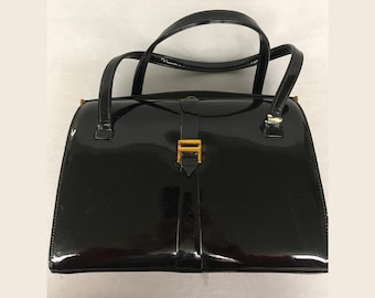 1960s Vintage Black Patent Leather hard frame handbag with double handles by NY designer Frank Milch, Dark gold hinge