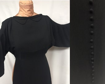 1930s XS Dramatic Black crepe evening gown with elegant, shirred sleeves, covered buttons, godets and insets, 28" Waist