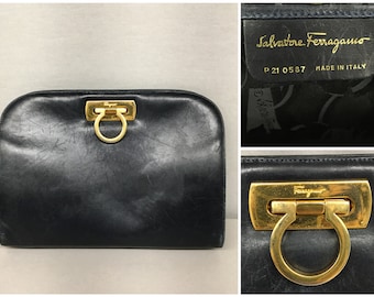 1980s Salvatore Ferragamo Navy Leather Gancini Fold Lock Convertible Clutch  Handbag with Removable Gold Chain strap, 11" x 8"