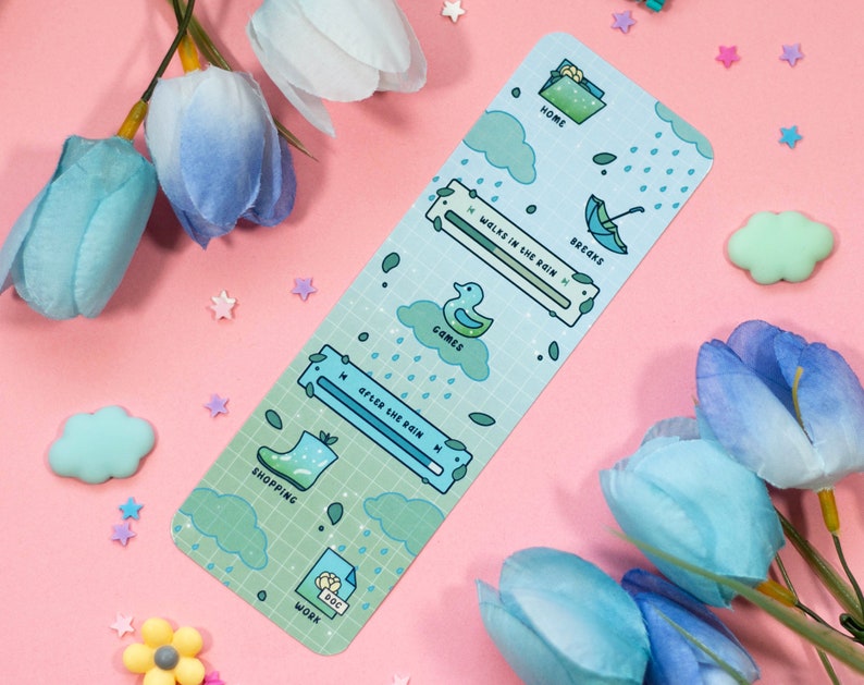 May include: A green and blue bookmark with a rainy day theme. It features a progress bar with the text "Walks in the rain" and a duck icon with the text "Games". Other icons include "Home", "Breaks", "After the rain", "Shopping", and "Work".