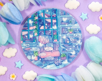 May include: A round coaster with a whimsical illustration of a cat reading in a cozy armchair. The scene is set in a room filled with bookshelves and a window with a view of a starry night sky. The coaster is perfect for adding a touch of whimsy to your home decor.