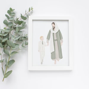 May include: A framed illustration of a man in a green robe and a young boy in a white suit, walking hand-in-hand. The man has a long beard and brown hair. The boy has short blonde hair. The illustration is set against a white background.