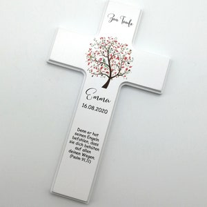 May include: White wooden cross with a pink and green tree design and the text "Zur Taufe" at the top. The name "Emma" and the date "16.08.2020" are printed below the tree. The text "Denn er hat seinen Engeln befohlen, dass sie dich beh&uuml;ten auf allen deinen Wegen. (Psalm 91,11)" is printed at the bottom.