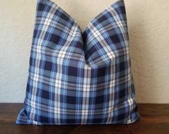 May include: Blue and white plaid pillow cover. The pillow cover is made of a soft, comfortable fabric and has a subtle sheen.