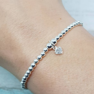 Pila di braccialetti con perline in argento sterling 925 Tre