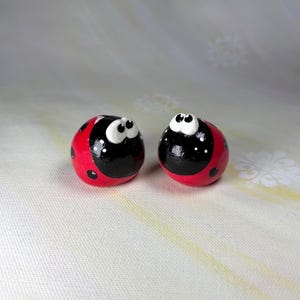 Clay Ladybug Figurines: Red & Black Shelf Decor, Set of 2