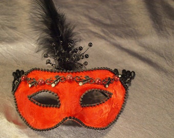 Alluring Red Victorian Masquerade Mask with Black Bead Detailing and Ostrich Feathers