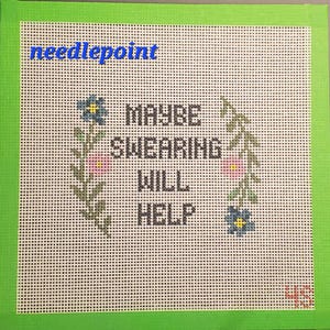 Könnte beinhalten: Nadelspitze-Leinwand mit dem Text "MAYBE SWEARING WILL HELP" in Schwarz. Das Design umfasst florale Akzente in Blau, Rosa und Grün, vor einem weißen Gitterhintergrund, umrahmt von einem grünen Rand.