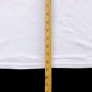 May include: White t-shirt with a hem that measures approximately 27 inches in length.