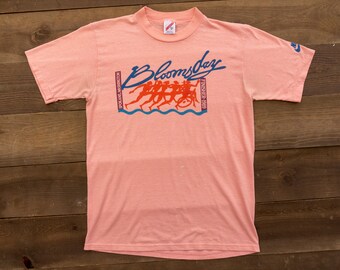 salmon colored shirt