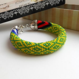 Idde de Orula con detalles de  Elegua Yemaya Religious jewelry  Santeria bracelet Yoruba bracelet Orisha jewelry bead  Elegua bracelet
