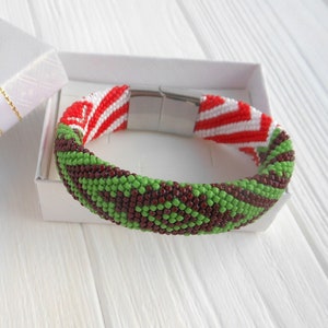 Ilde Orunmila con detalles Shango African tradition colors green and brown beads , Orunmila Yoruba Bead bracelet Santeria charm bracelet