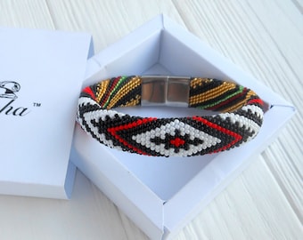 Idde de Elegua con detalles de Oshun Ibukole Santeria beads Yoruba religion bracelet Santeria gift for brother