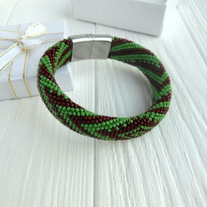 Ilde Orunmila African tradition colors green and brown beads , Orunmila Yoruba Bead bracelet Santeria charm bracelet