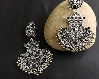Oxidizer earrings discount