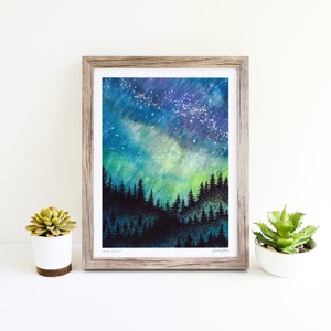 Watercolor art print of the Aurora Borealis or Nothern Lights over a silhouetted pine tree forest, painted by Lauren Alane
