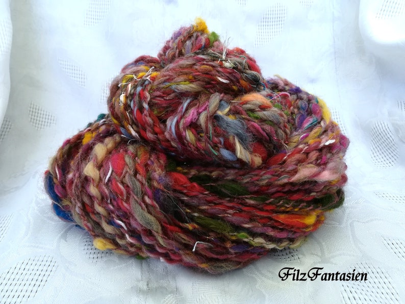 Art Yarn handgesponnen, Effektgarn mit Wolllocken und Angelina, Strickgarn, Textilkunst, Webgarn Bild 1