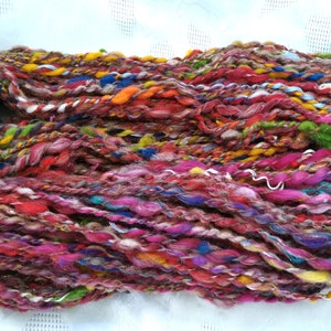 Art Yarn handgesponnen, Effektgarn mit Wolllocken und Angelina, Strickgarn, Textilkunst, Webgarn Bild 3