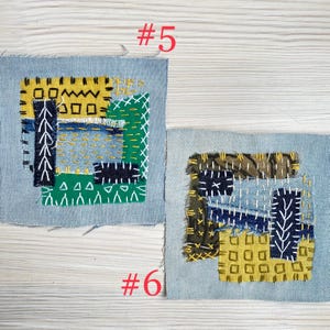 Collection of handmade boro sashiko denim patches created from recycled jeans and fabric scraps with decorative hand stitching.