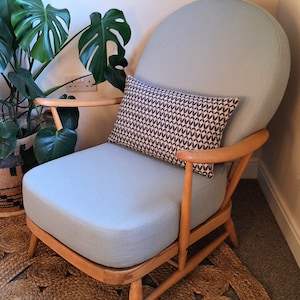 ERCOL 203 easy chair cushions and covers in a pale blue cotton piped or unpiped with foam