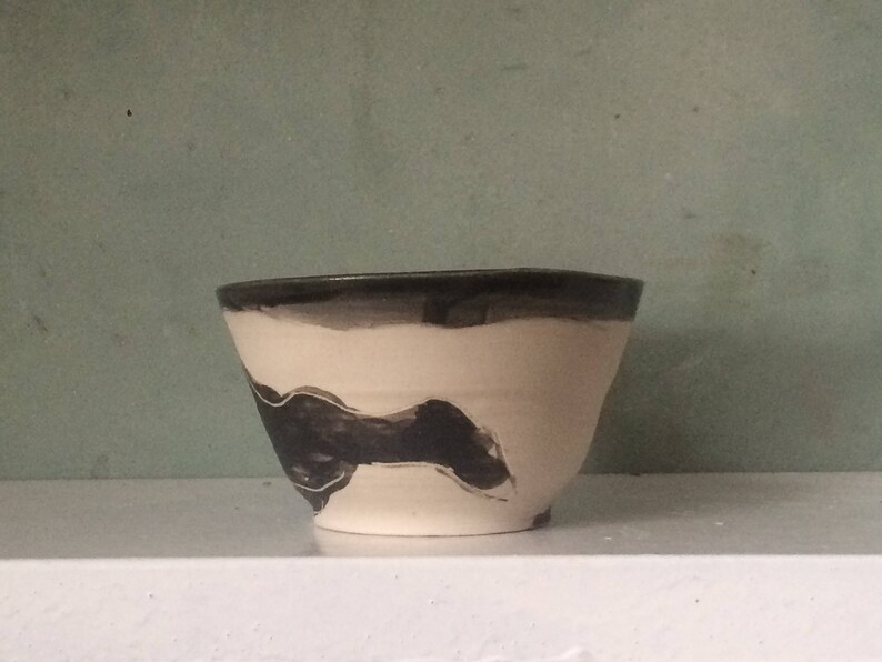 smooth black enamel lead handmade sleeping figure drawing. carved black slip for tea or coffee stoneware Bowl