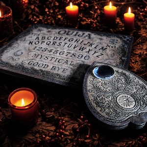 May include: A vintage Ouija board with a planchette, surrounded by lit candles. The board is dark with engraved letters, numbers, and phrases. The planchette has a clear lens. The scene is dimly lit, creating a mystical atmosphere.