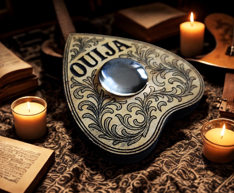 May include: A heart-shaped Ouija board with the word "OU IJA" in black lettering. The board has ornate floral designs and a planchette. Lit candles and open books surround the board, creating a mystical atmosphere.